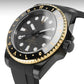 Black and gold watch with a detailed face on a gray background